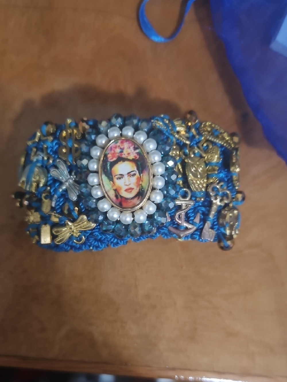Frida Khalo Blue Crochet Charm Bracelet with Gold Accents - Picture 7 of 8